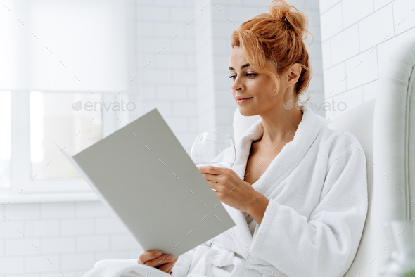 Calm emotions. Waist up portrait view of the caucasian woman reading clients agreement