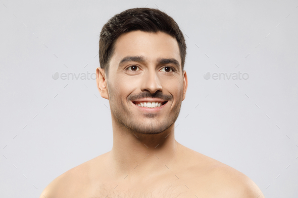 Headshot Portrait Of Handsome Guy Standing With Naked Shoulders Concept Of Men Beauty Stock