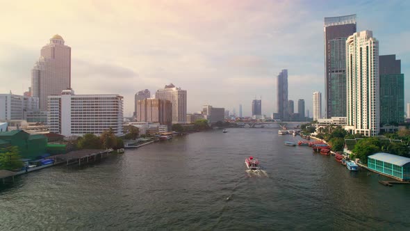 4K UHD : Aerial view over the Chao Phraya River and Buildings alt