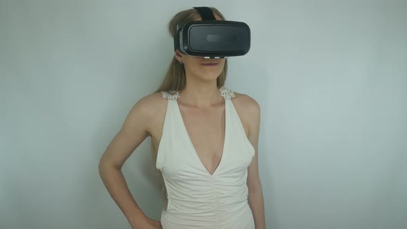 Girl And Modern Technology Of Virtual Reality Helmets