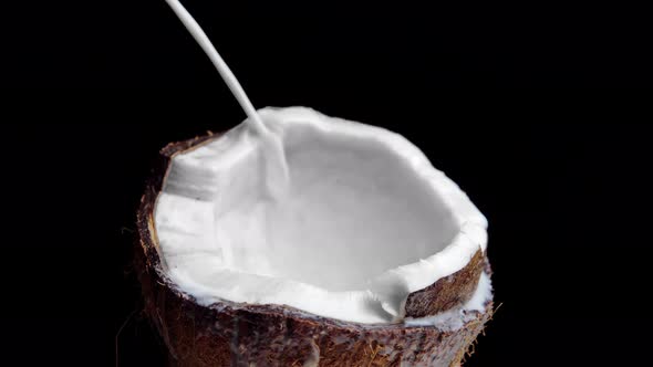 Pouring the Coconut Milk Close Up