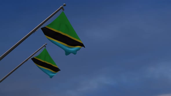Tanzania Flags In The Blue Sky - 4K