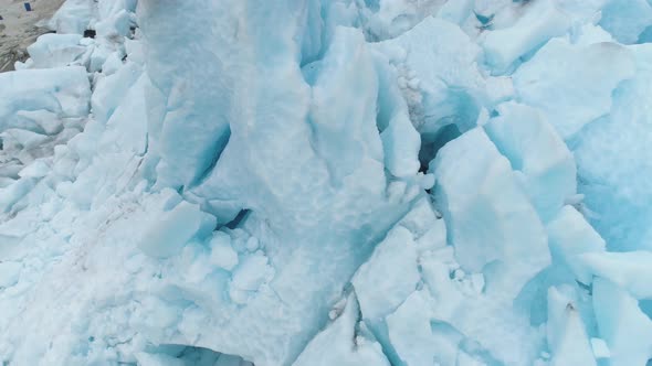 Blue Nigardsbreen Glacier Is Arm of Jostedalsbreen Glacier in Norway. Ice Blocks. Aerial View alt