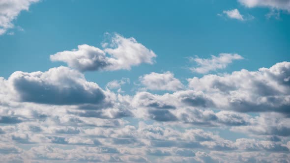 Timelapse of Cumulus Clouds Moves in Blue Dramatic Sky Cirrus Cloud Space alt