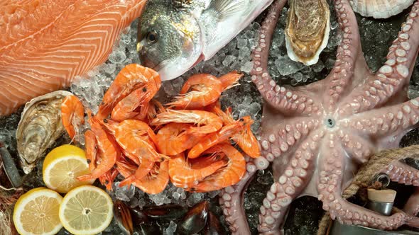 Super Slow Motion Shot of Falling Fresh Prawns Into Crushed Ice at 1000 Fps alt