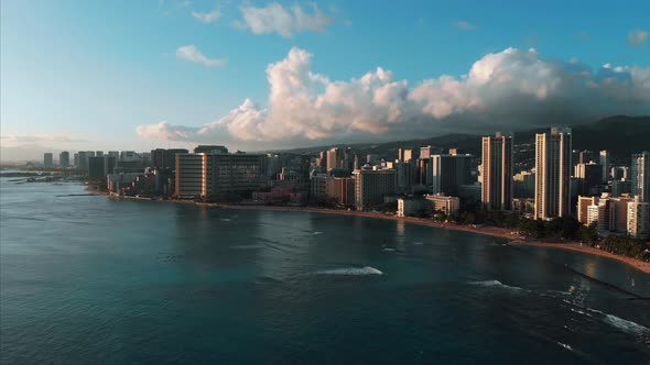Aerial drone footage of Honolulu, Hawaii. Beautiful real estate, buildings in the city. Palm trees alt