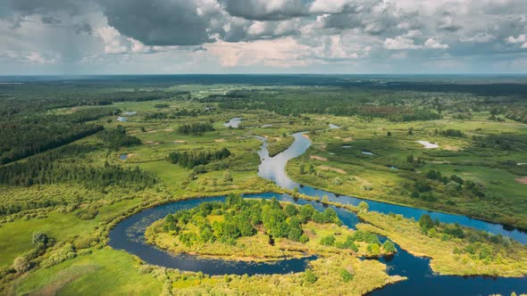 Timelapse Dronelapse Hyperlapse Aerial View Spring Forest Woods And Curved River Marsh alt