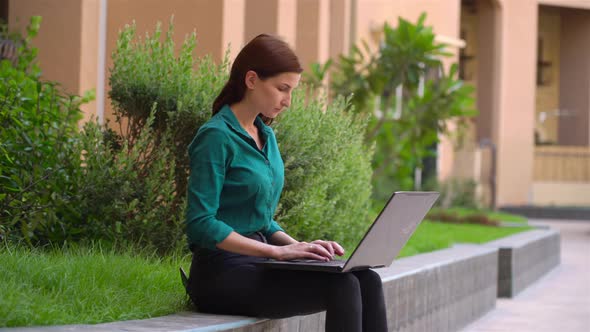 Office Girl with a Laptop