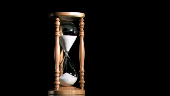 Old hourglass in super slow motion