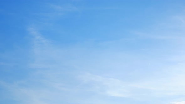 4K Time lapse of beautiful blue sky with clouds background, Blue sky with clouds and sun. alt