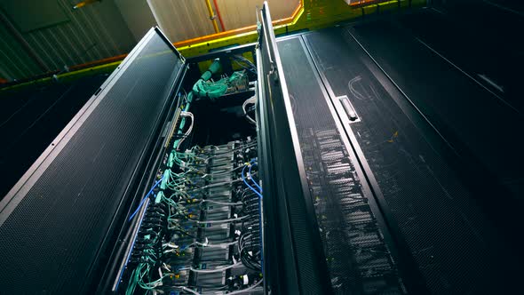 One Computer with Many Cables in a Server Room. alt