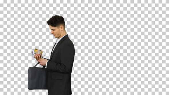 Young Business Man Walking Counting Euro Bills, Alpha Channel alt