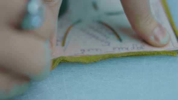 Sewing Machine in a Leather Workshop in Action with Hands Working on a Leather Details for Shoes alt