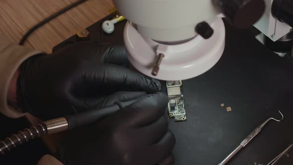 Motherboard Repair Under a Microscope