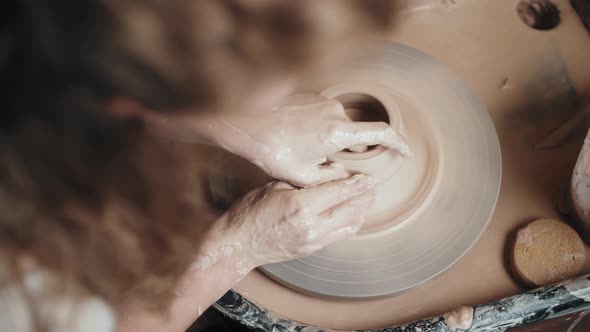 Close Up of Potter Clay Wheel Pottery Workshop Woman Making Diy Pot to Sale in Ecommerce Store Home alt
