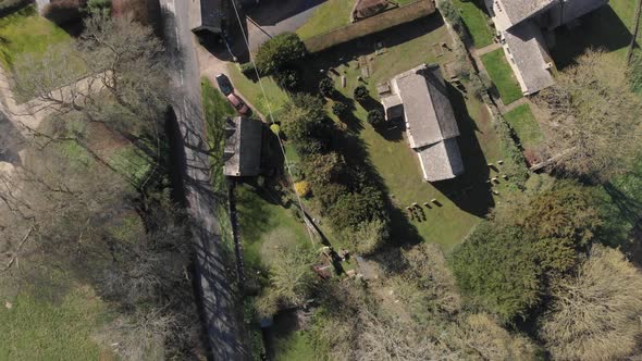 Cotswolds Rural English Village Norman Church Bird's Eye View Aerial 4K D Log