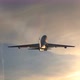 Passenger Airplane Is Climbing After Take Off During Scenic Sunset - VideoHive Item for Sale
