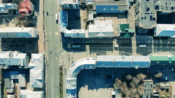 Urban Driveway with Few Cars on It in a View From Above alt