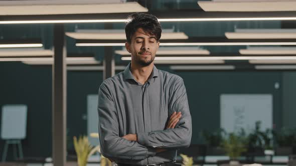 Confident Male Indian Arab Businessman Professional Worker Employee Man Stand in Office with Crossed alt