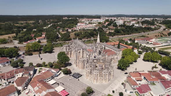 Birds eye view overlooking at historical monument building, Batalha monastery in Portugal. alt