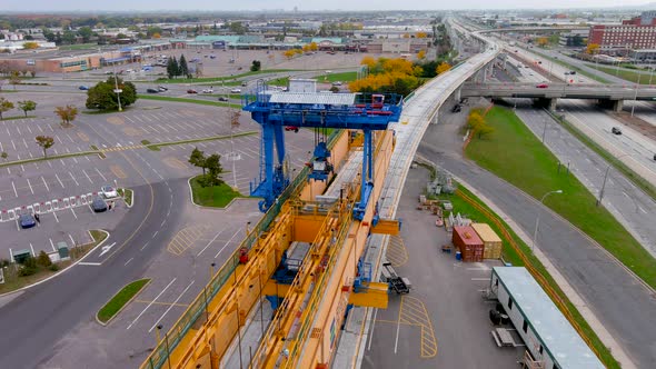 4K camera drone view of the construction site of the Metropolitan Express Network in Montreal.