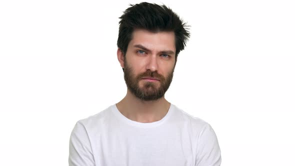 Caucasian Man Looking Making I Am Watching you Gesture on White Background alt