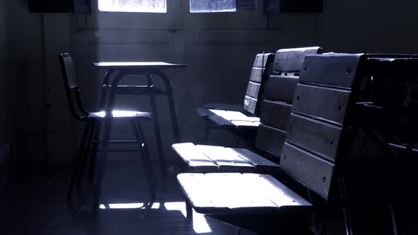 Vintage Desks in an Empty School Classroom. alt