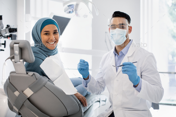 Root Canal Treatment.. Stomatologist In Medical Mask Having Checkup With Female Patient
