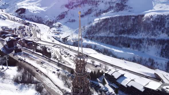 Majestic Winter Aerial Landscape and Ski Resort with Typical Alpine Wooden Houses in French Alps