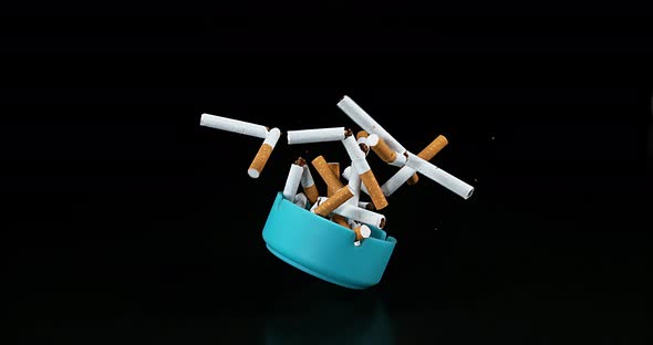 Ashtray and Cigarettes Falling against Black Background, Slow Motion 4K alt