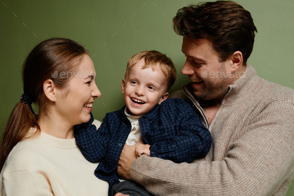 Happy Parents with Little Boy - Stock Photo - Images