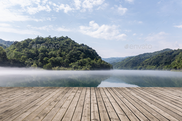 beautiful fog river with wooden floor - Stock Photo - Images