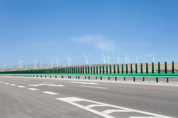 modern highway with wind farm - Stock Photo - Images