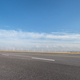 empty asphalt road with wind farm - PhotoDune Item for Sale