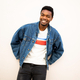 relaxed young black man in denim jacket against white background - PhotoDune Item for Sale