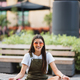 Happy young woman sitting outdoors in yoga position - PhotoDune Item for Sale