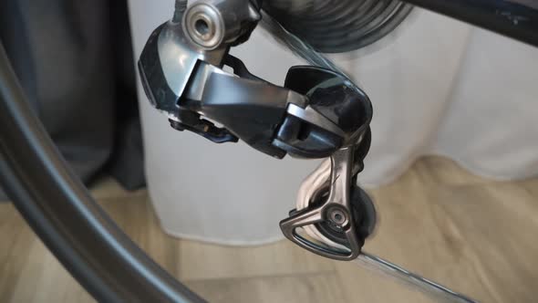 Bicycle gear changing. New cassette with gears and chain on the rear wheel. alt