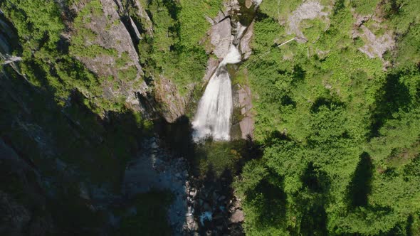 Waterfall Korbu in forest of Altai