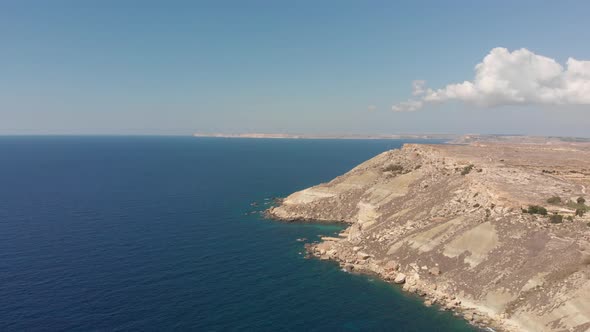 Aerial drone video from western Malta, Mgarr area, Fomm ir-Rih bay. alt