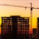 Silhouette of Crane and Building Under Construction at Dusk. - PhotoDune Item for Sale