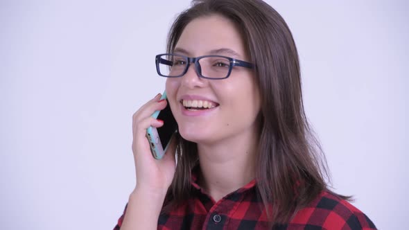Face of Happy Young Beautiful Hipster Woman Talking on the Phone alt