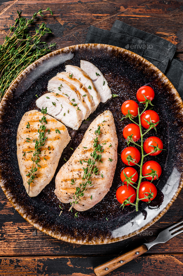 Protein dinner grilled Turkey breast fillet steaks on a plate with