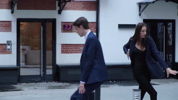 Cheerful Girl and Happy Young Man with Long Hair are Actively Dancing Meme Moves alt