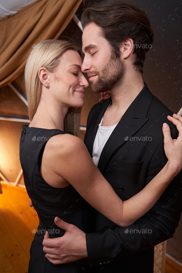 Couple having a tender moment during their romantic dance