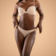 African american woman in underwear demonstrating her perfect body Stock  Photo by Prostock-studio