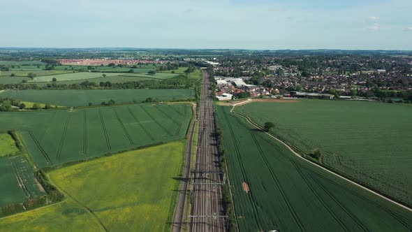 Railway in the countryside and trains passing, aerial view