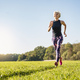 Senior woman running on rural meadow - PhotoDune Item for Sale