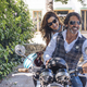Portait of happy mature couple on a vintage motorbike - PhotoDune Item for Sale