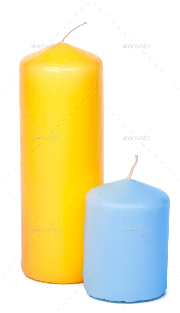 Colored candles of different size on white background Stock Photo by FabrikaPhoto