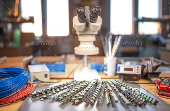 Modern microscope, Panel of LED light indicators is in the production ...